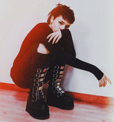 Gothic chic with space-age shimmer Damnedknee-high boots
